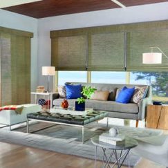 Window: Standard Roman Woven Wood Shades with Cordless Lift: Aftan, Macaroon 95084 with 1" Edge Banding: Smoke 7175 and 6" Premium Valance in Vertical Orientation (Multiple Shades on One Headrail) Doors: Sliding Panels with Wand Control: Aftan, Macaroon 95084 with 1" Edge Banding: Smoke 7175 and 6" Premium Valance in Vertical Orientation